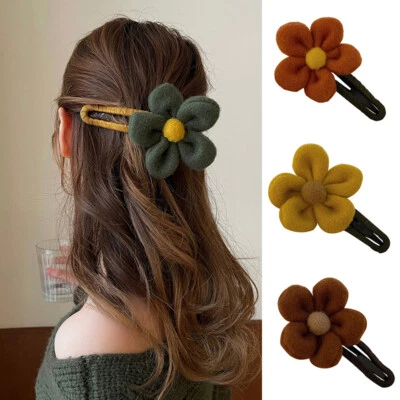 Elegante pinza para el cabello con flores de felpa para mujeres horquilla pinzas para el cabello pasadores Foto 1 de 4