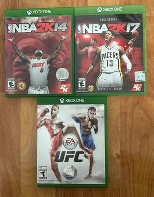 Lot of 3 - UFC, NBA2K14, NBA2K17  (Microsoft XBox One) - Image 1 of 3
