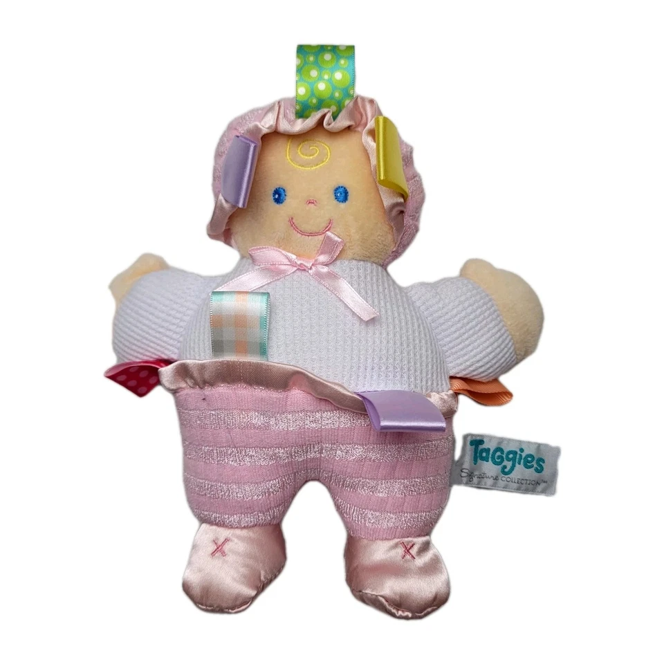 Taggies Mary Meyer Bebé Muñeca Peluche Tejido Waffle Rosa Peluche Suave Juguete Foto 1 de 4