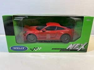 Modellino auto Porsche 911 Carrera 4S pressofuso: scala 1/24, nuovo con scatola di Welly - Foto 1 di 7