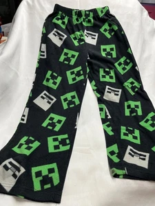 Lotto 4616 - Pantalone lounge ragazzo nero e verde - Taglia 8 - Foto 1 di 2