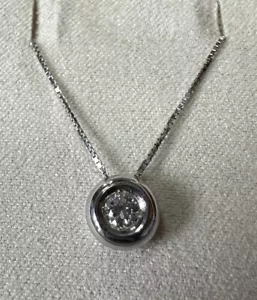 COLLANA PUNTO LUCE IN ORO BIANCO 18kt. DIAMANTE NATURALE BRILLANTE ct. 0,20 - Foto 1 di 6