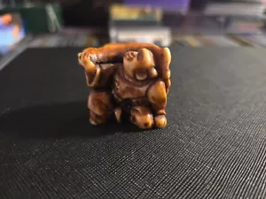 Verbundharz japanische Netsuke Mann eine Seite Dämonenmaske die andere - Bild 1 von 2