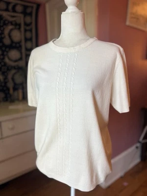 Suéter de mujer marfil crema punto cuello redondo manga corta 14/16 Foto 1 de 4