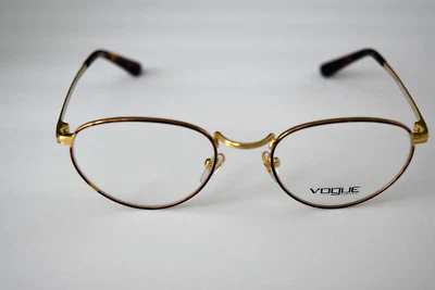 Gafas ópticas 52-20-135 Vogue Gold Havana Ovaladas Rx VO4084 5078 Foto 1 de 4