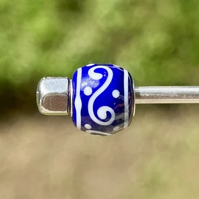 Trollbeads unique glass bead mini barrel blue base white ornaments - Image 1 of 4