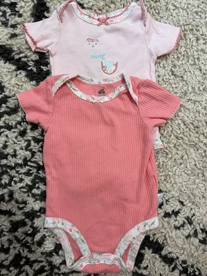 Body rosa manga corta Just Born - 3-6 meses Foto 1 de 4