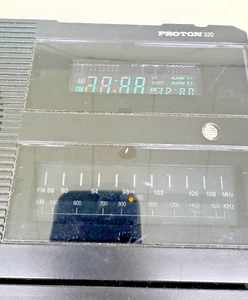 Vintage Proton 320 AM/FM Dual Alarm Clock Radio Black Retro Bass Treble RARE - Picture 1 of 7