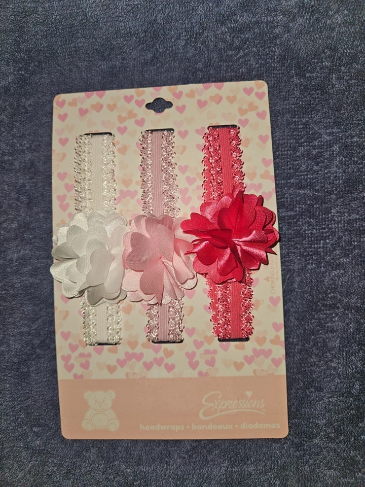Expressions Baby Headbands for girls in white, light pink and pink - Image 1 of 1