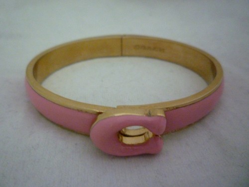 Bracciale Coach Signature placcato oro e smalto rosa cerniera fibbia C Nuovo