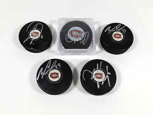 Lot of (5) Assorted Signed Montreal Canadiens Hockey Pucks Autos