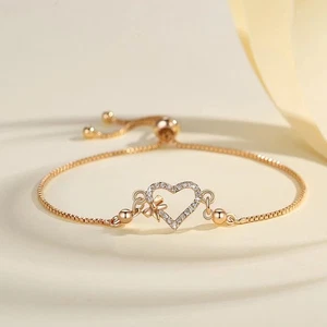 Bezauberndes verstellbares Paar Armband in Kupfer mit Herz und funkelnden Diaman - Picture 1 of 6