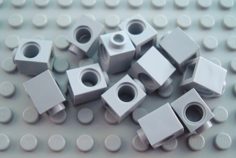 LEGO Lot of 12 Light Bluish Gray 1x1 Technic Brick Pieces - Image 1 of 1