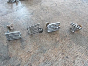 ORIGINAL E,E,S,T, QUARTER PANEL LETTER EMBLEMS  FOR 1965 PONTIAC TEMPEST - Picture 1 of 7