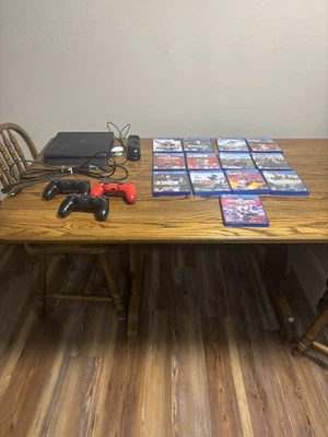 Sony PlayStation 4 Slim Original Black, With 3 Controllers, 13 Games And Charger - Image 1 of 4