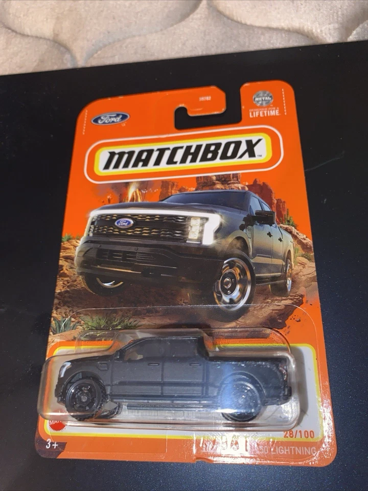 Matchbox  2022 Ford F-150 Lightning #28/100  Case M 2024 Black - Image 1 of 3