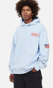 Felpa con cappuccio uomo H&M NASA toppe riflettenti bandiera americana blu chiaro taglia large  - Foto 1 di 17