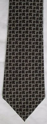 CORBATA GEOMÉTRICA BLANCA Y NEGRA VINTAGE OLEG CASSINI BIRMANIA MILTON'S Foto 1 de 3