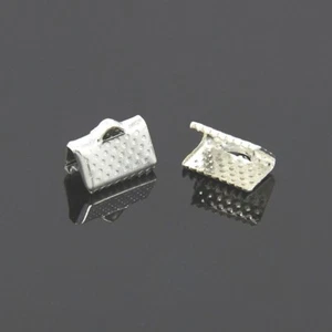 50er SET KLEMMENSPITZEN BAND mit Krallen grobkörnig 10 x 7 mm SILBER - Bild 1 von 1