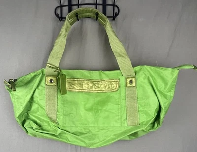 Спортивная сумка Neiman Marcus лаймовая зеленая с подкладкой с наружным боковым карманом на молнии - Изображение 1 из 4