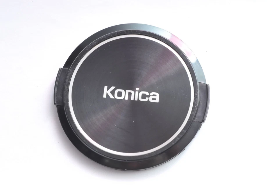 Konica 55mm Front Lens Cap Hexanon Metal Name Plate - Image 1 of 2