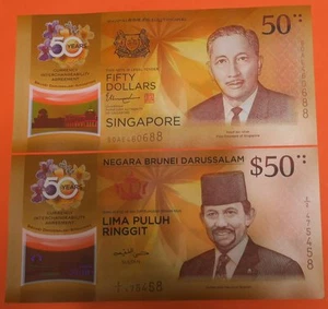 Singapore and Brunei $50 pair 2017 Issue GEM UNC - Picture 1 of 2