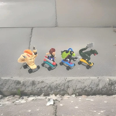 Lote de 4 figuras de acción Savage Mondo Blitzers 1991 Kenner 1,5-2" sobre ruedas Foto 1 de 4