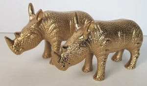 Estatuas de rinoceronte de metal tono dorado peso pesado L17,5 cm decorativas en muy buena condición - Imagen 1 de 13