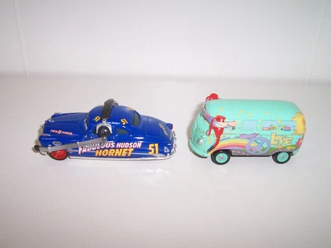 Disney Cars Pit Crew Member Doc Fabulous Hudson Hornet & Pit Crew Fillmore Lot Cover