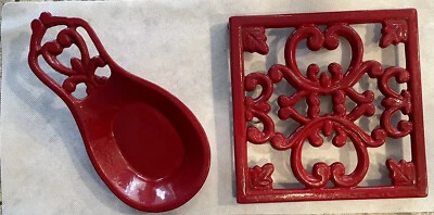 Reposacuchara y remache de hierro fundido macizo esmaltado rojo vintage Foto 1 de 4