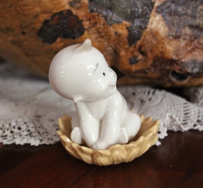 Nao by  Lladro Where Do Babies Come From - A Sunflower! Rare Baby Made in Spain - image 1 of 4