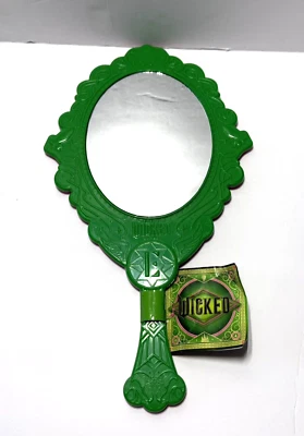Espejo de mano de dos caras Wicked Movie verde y rosa objetivo Bullseye patio de recreo Foto 1 de 4