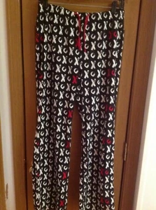 Pantaloni da salotto Love In The Air. X e O's. Nuovo senza etichette (medio) - Foto 1 di 3