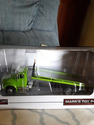 NIB 1/64 Lime Green International IH 8600 Rollback Tow Truck SpecCast - Image 1 of 4