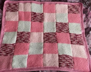 HAND KNITTED BABY BLANKET IN PINK MIX - Picture 1 of 2