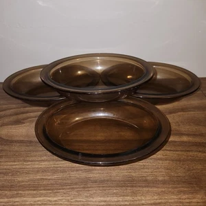 4 - Tazón pequeño ovalado de vidrio marrón humo ámbar PYREX 8x6x1,75 pulgadas para hornear Inglaterra - Imagen 1 de 5