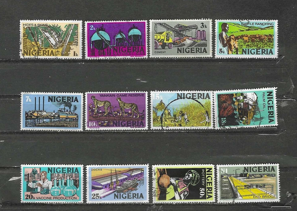 NIGERIA, 1973/74, VIDA/NEGOCIOS, JUEGO DE 12 SELLOS, PERF, VLH/USADO, CV$10,80 Foto 1 de 1