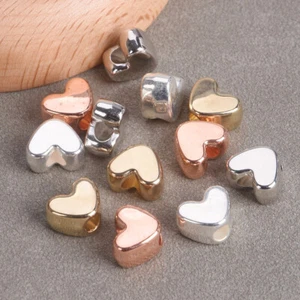 Cuentas sueltas de plástico CCB enchapadas en oro rosa/plata de 12x9 mm corazón 20 piezas joyería hágalo usted mismo - Imagen 1 de 8