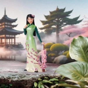 Enesco Disney Showcase - Statuetta botanica di Mulan appoggiata su un ombrello - Foto 1 di 7