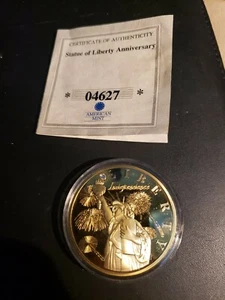 MONEDA CONMEMORATIVA AMERICANA COMO NUEVA 24K EN CAPAS ESTATUA DE LA LIBERTAD CON CERTIFICADO DE AUTENTICIDAD - Imagen 1 de 5