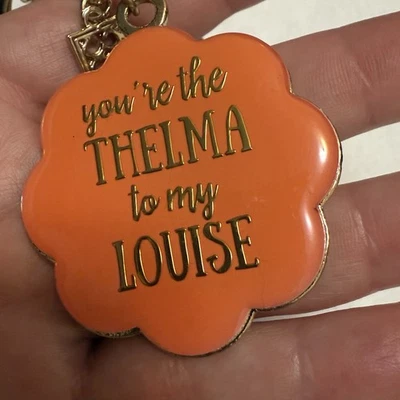 Bolso de película Thelma y Louise encanto ¡NUEVO! Cartera Llavero Borla Bling Oro Melocotón Foto 1 de 4