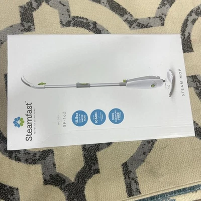 Fregona portátil de piso duro STEAMFAST tanque de agua ligero con cable blanco Foto 1 de 2