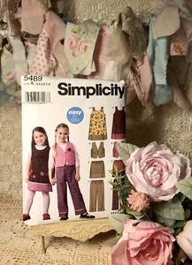 Simplicity Pattern 5489 Childs Jumper Vest Pants & Skirt Size 3-8 NEW UNCUT - Picture 1 of 5