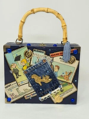DE COLECCIÓN GLORI G CAJA DE CIGARROS BOLSO MONEDERO BOHO RUBIO BEBÉ AZUL MANGO DE BAMBÚ Foto 1 de 4