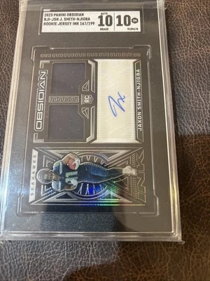 2023 Jaxon Smith-Njigna #RJI-JSB Jersey Ink /199 SGC 10 - Image 1 of 2