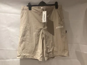 PANTALONES CORTOS ADIDAS TERREX POLYGIENE PARA HOMBRE NUEVOS TALLA MEDIANA CREMA B6 - Imagen 1 de 4