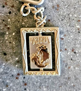 Arizona Souvenir Schlüsselanhänger Spinner Fass Chile Paprika zweifarbig Schraubverschluss - Bild 1 von 3