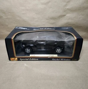 Chrysler PT Cruiser Maisto Escala 1/18 Negro Coche Montado Con Placa Y Caja Nuevo - Imagen 1 de 5