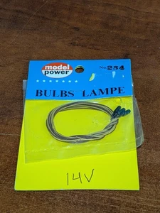 Model Power - HO Scale - #254 - 14V Grain Of Rice Green Light Bulbs (3) - NOS - Picture 1 of 3