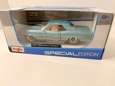 Maisto 1:26 1965 Buick Riviera Special Edition – Light Blue Metallic - Image 1 of 4
